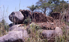 Remains of a stone-walled house at the deserted hilltop defensive site of Yagala, Sierra Leone (West Africa)