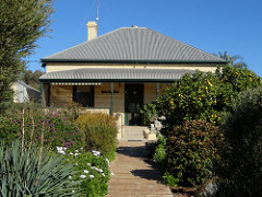 One of the Seven Sister houses built by Captain Arnold in Mannum in 1911. They are all identical and made of pressed tin.