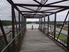 Bridge over Highway between parking and Blue Bayou / Dixie Landin