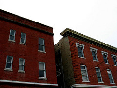 Red Brick Building Windows Lake City Overcast