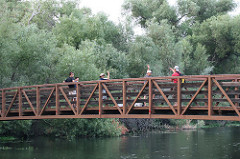 The guys fishing from the bridge near our camp site