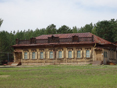 House for profit showing capitalism in the early 20th century these seems to mean a house that rented out rooms but not for free ethnographical museum Ulan Ude Russia